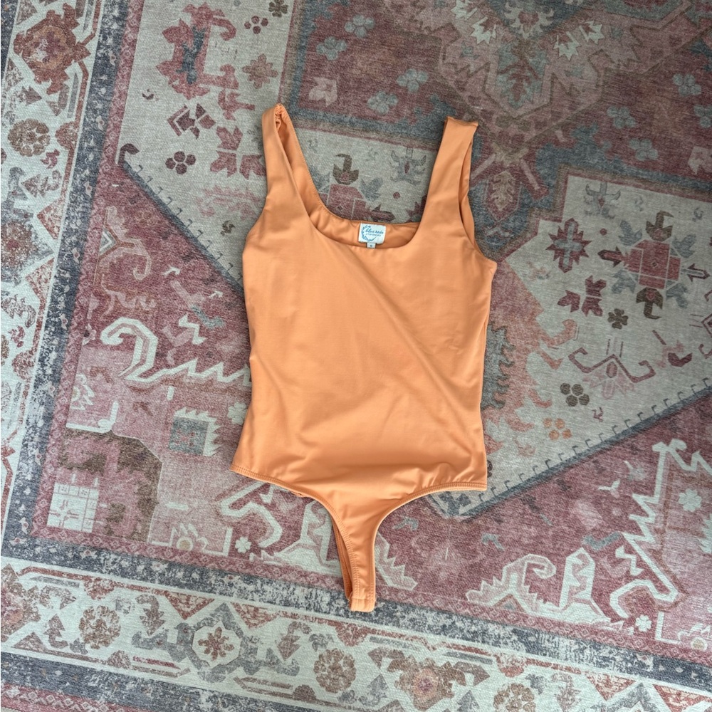 Francesca’s Coral Body Suit